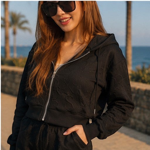 THREE PEACE black Y2K lounge set with cropped zip-up hoodie and shorts, featuring jacquard monogram pattern.