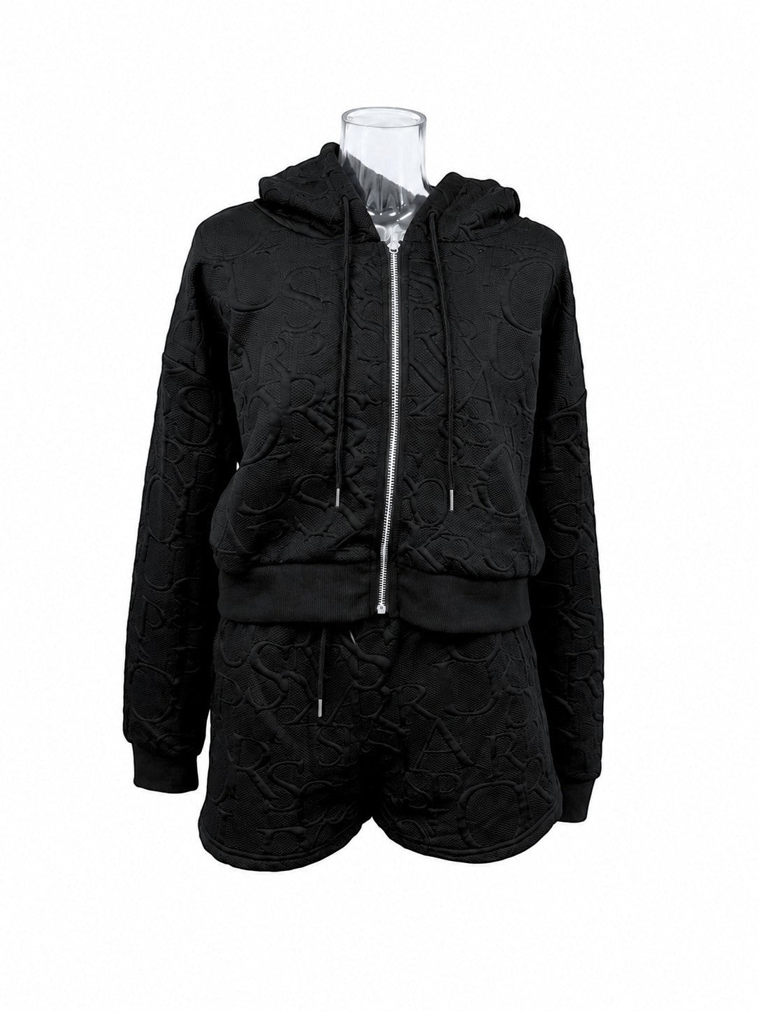THREE PEACE black Y2K lounge set with cropped zip-up hoodie and shorts, featuring a tone-on-tone jacquard monogram pattern. Polyester.