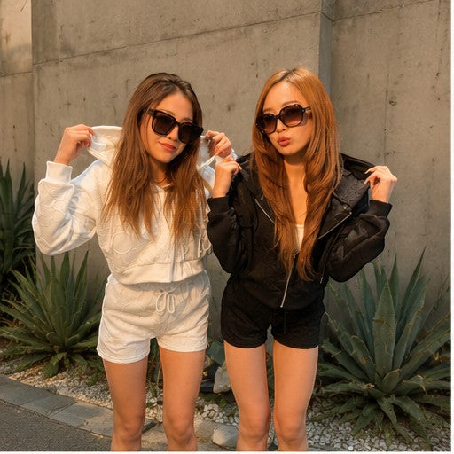 THREE PEACE white Y2K lounge set: cropped zip-up hoodie and shorts with jacquard monogram pattern. Polyester.